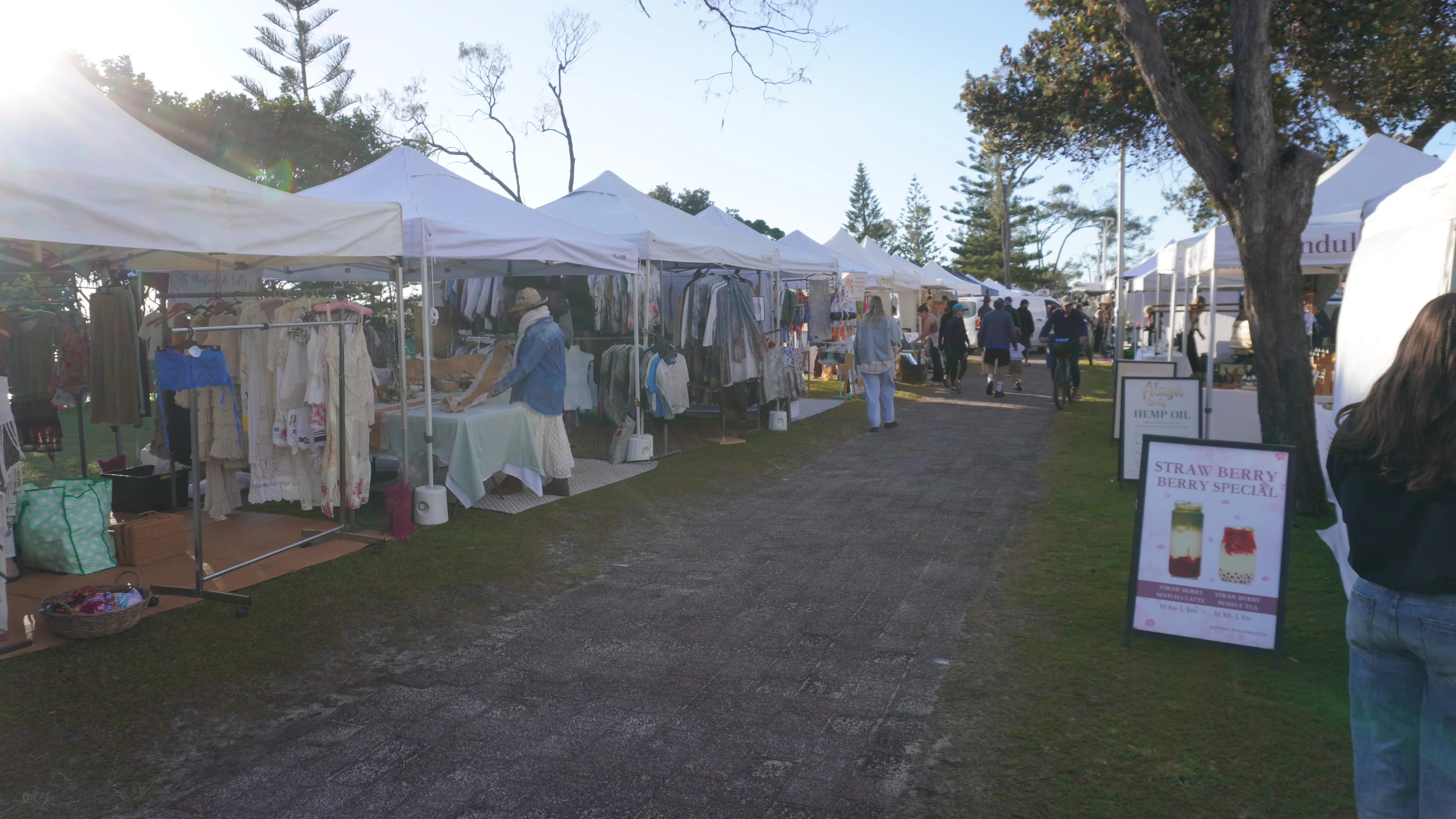 Arts and crafts market stalls looking towards Byron Bay Surf Club