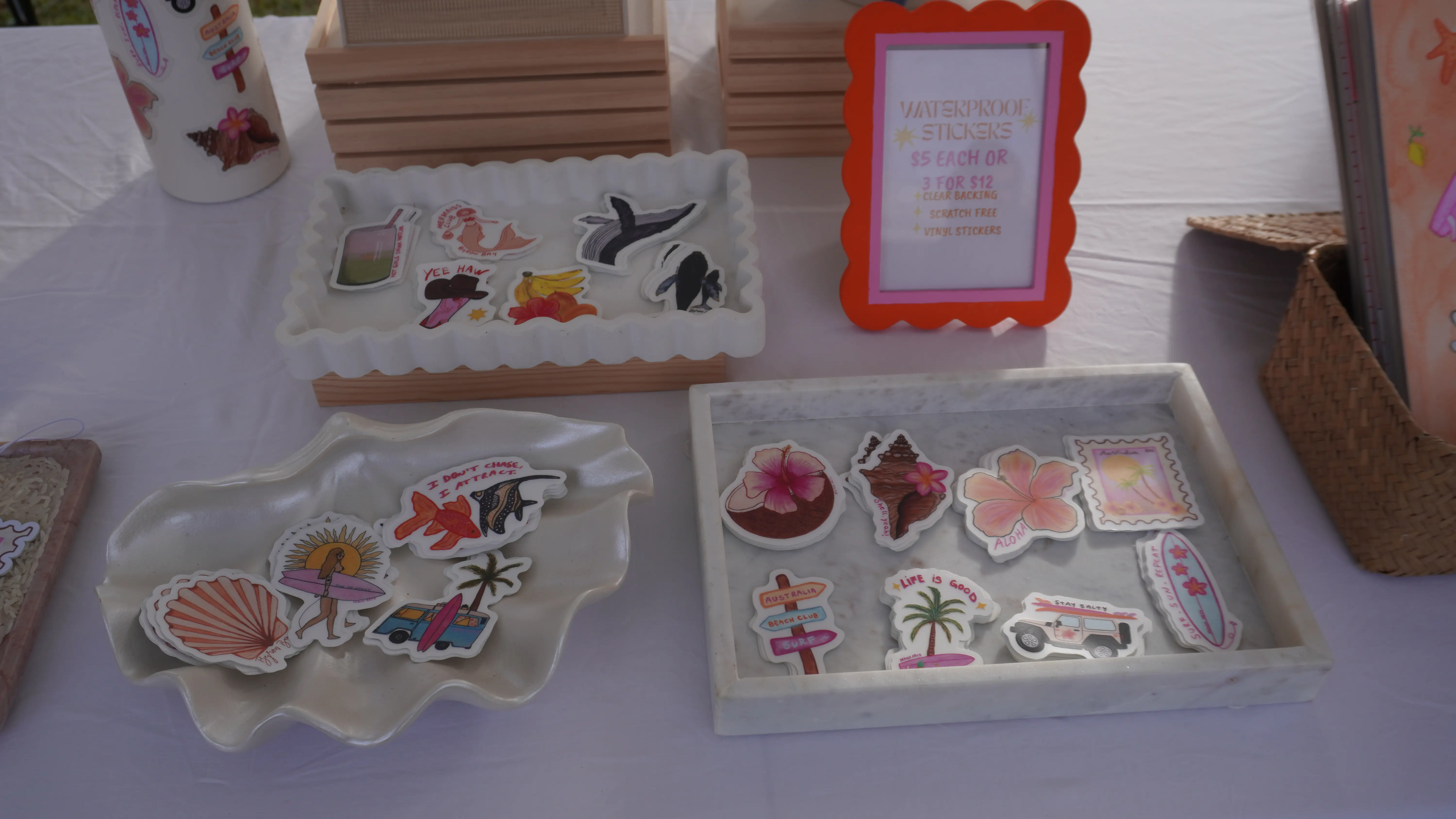 Colourful Mana Arts prints and market display