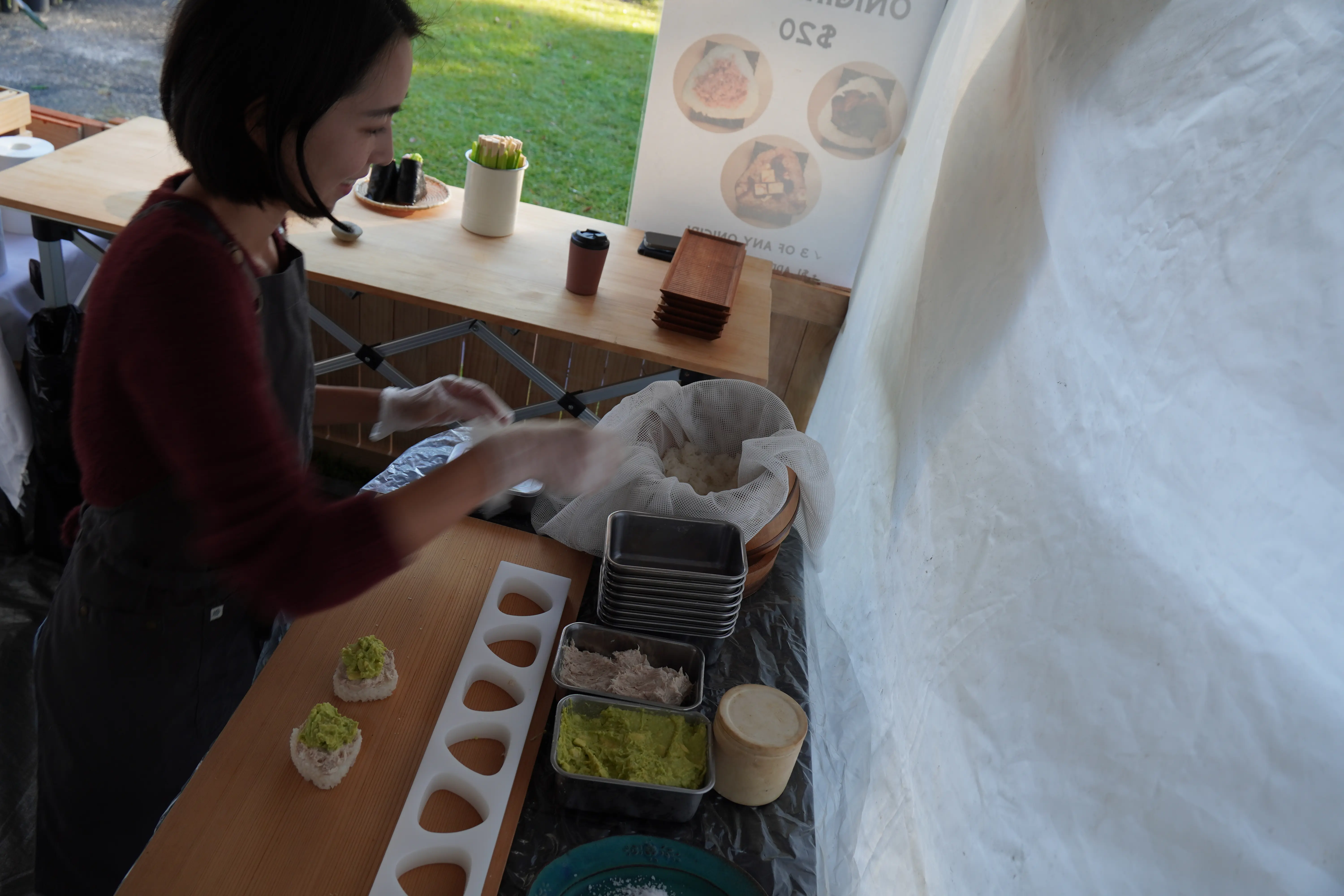 Pocket Rice stall preparing Japanese rice balls at Mullumbimby Community Markets